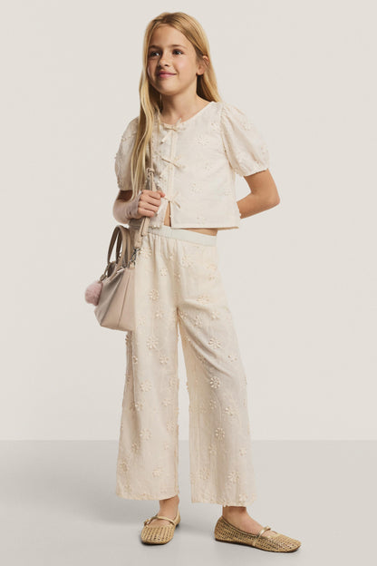 Embroidered relief blouse