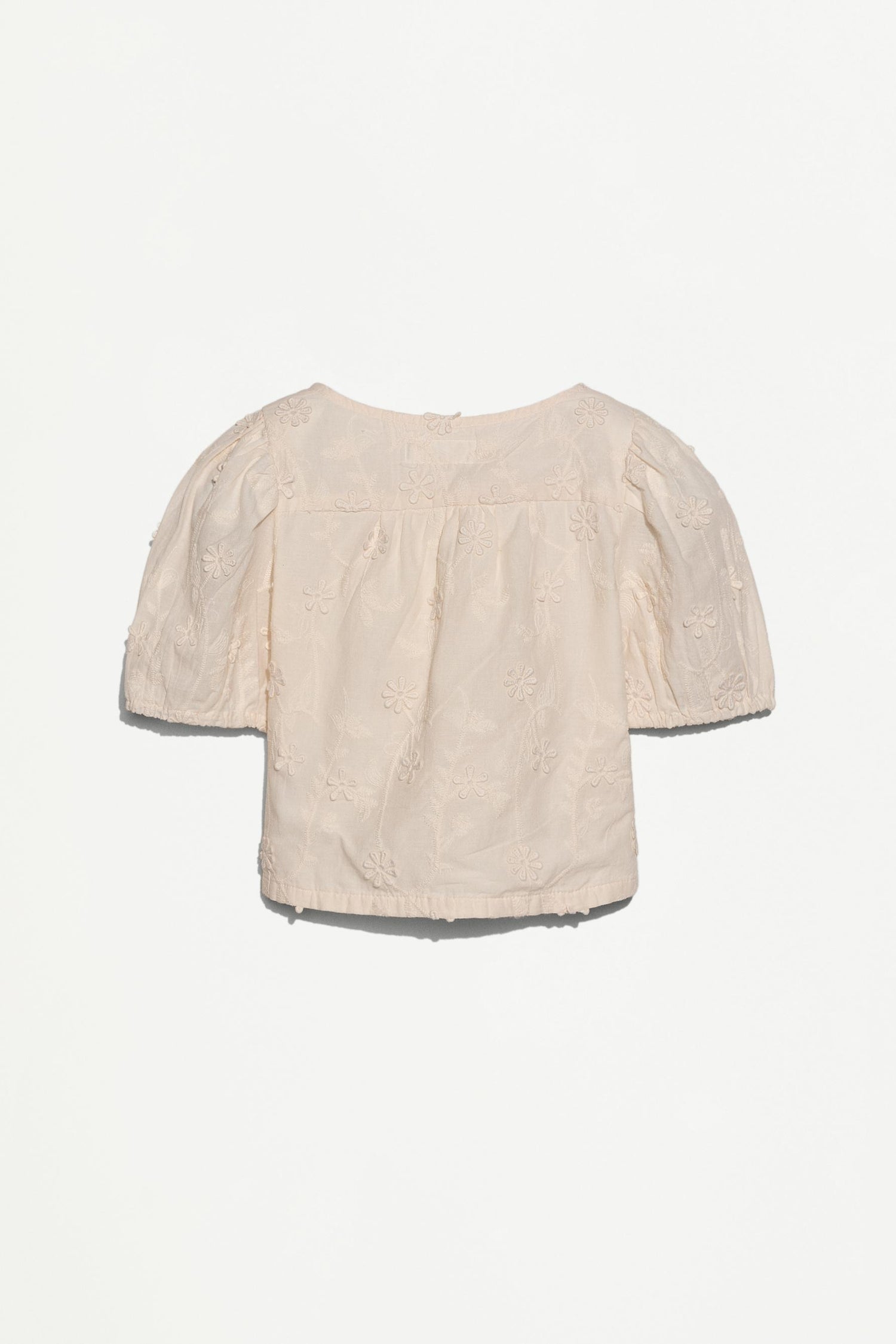 Embroidered relief blouse