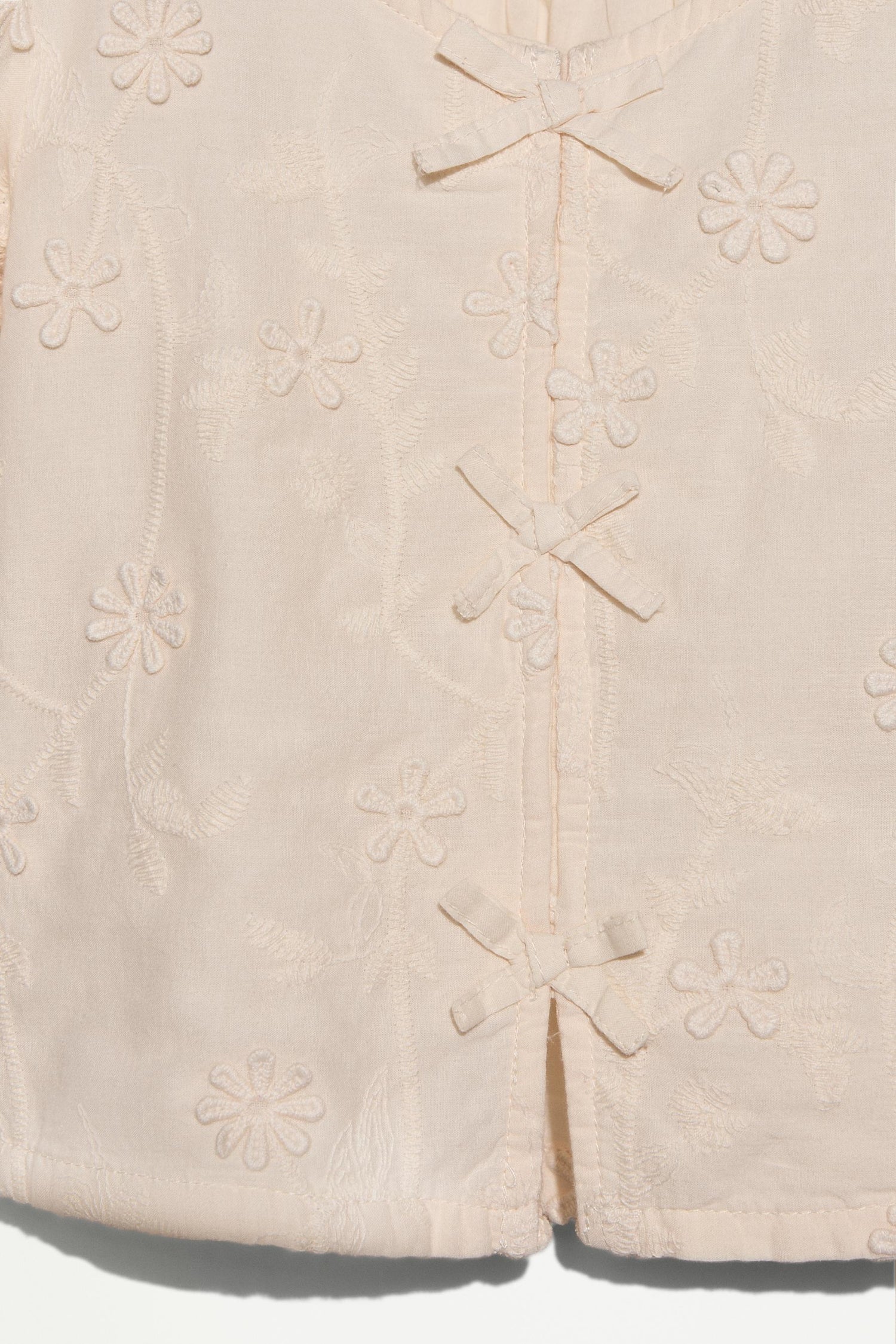 Embroidered relief blouse