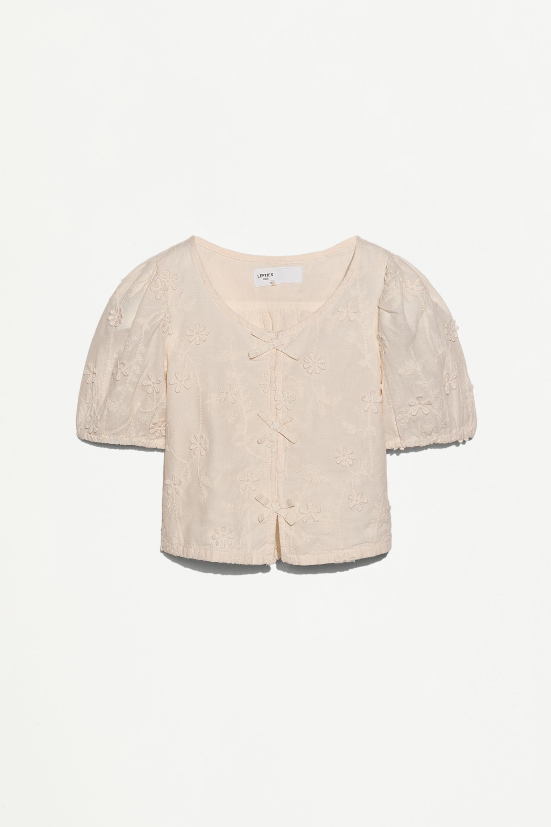Embroidered relief blouse