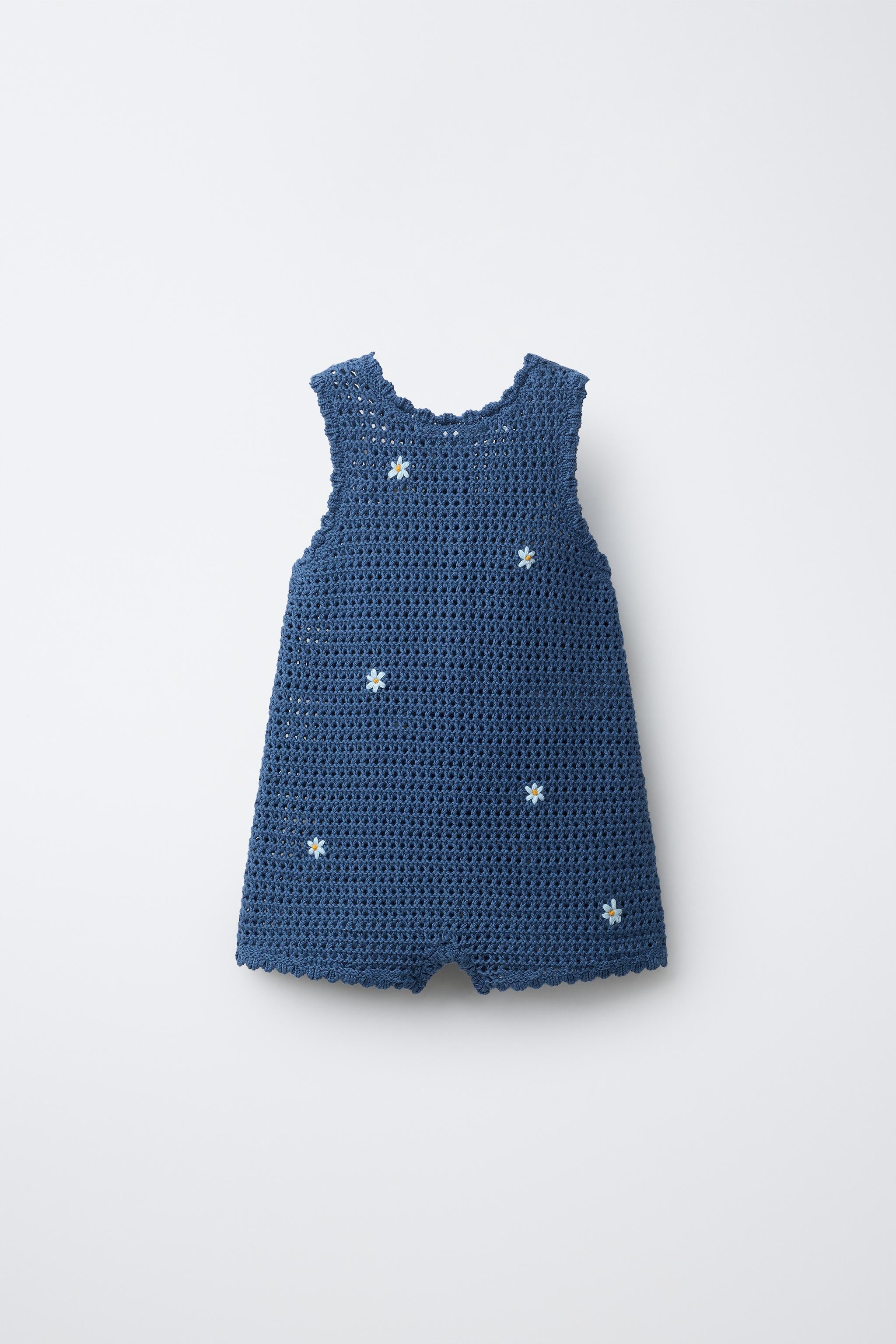 CUTWORK KNIT ROMPER WITH EMBROIDERED FLOWERS