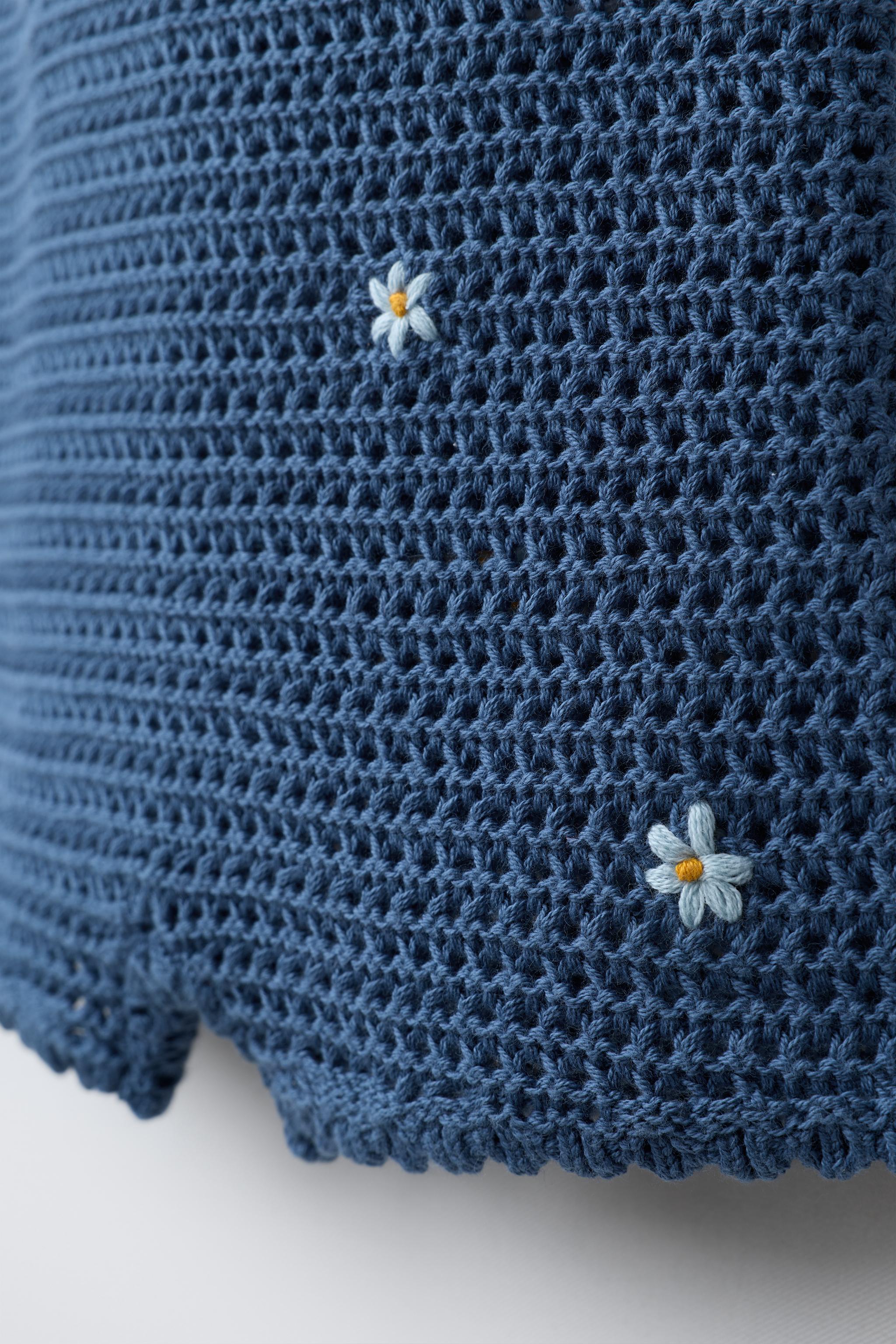CUTWORK KNIT ROMPER WITH EMBROIDERED FLOWERS
