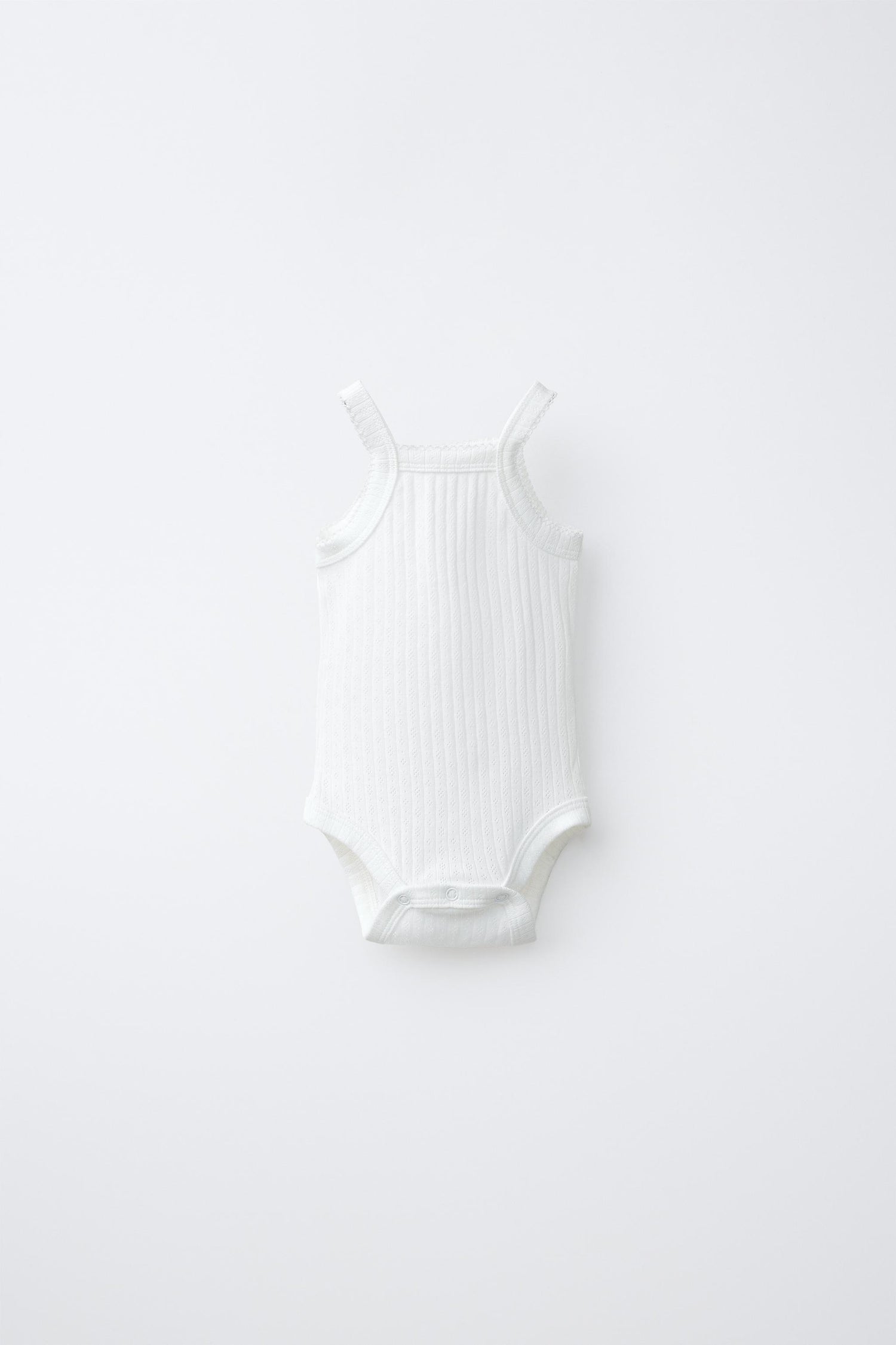 3-PACK OF POINTELLE STRAPPY BODYSUITS