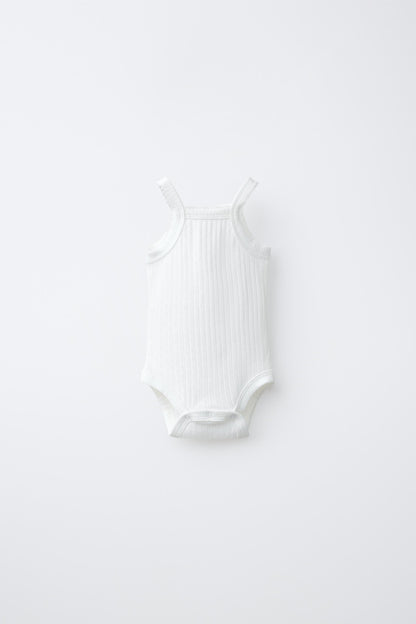 3-PACK OF POINTELLE STRAPPY BODYSUITS