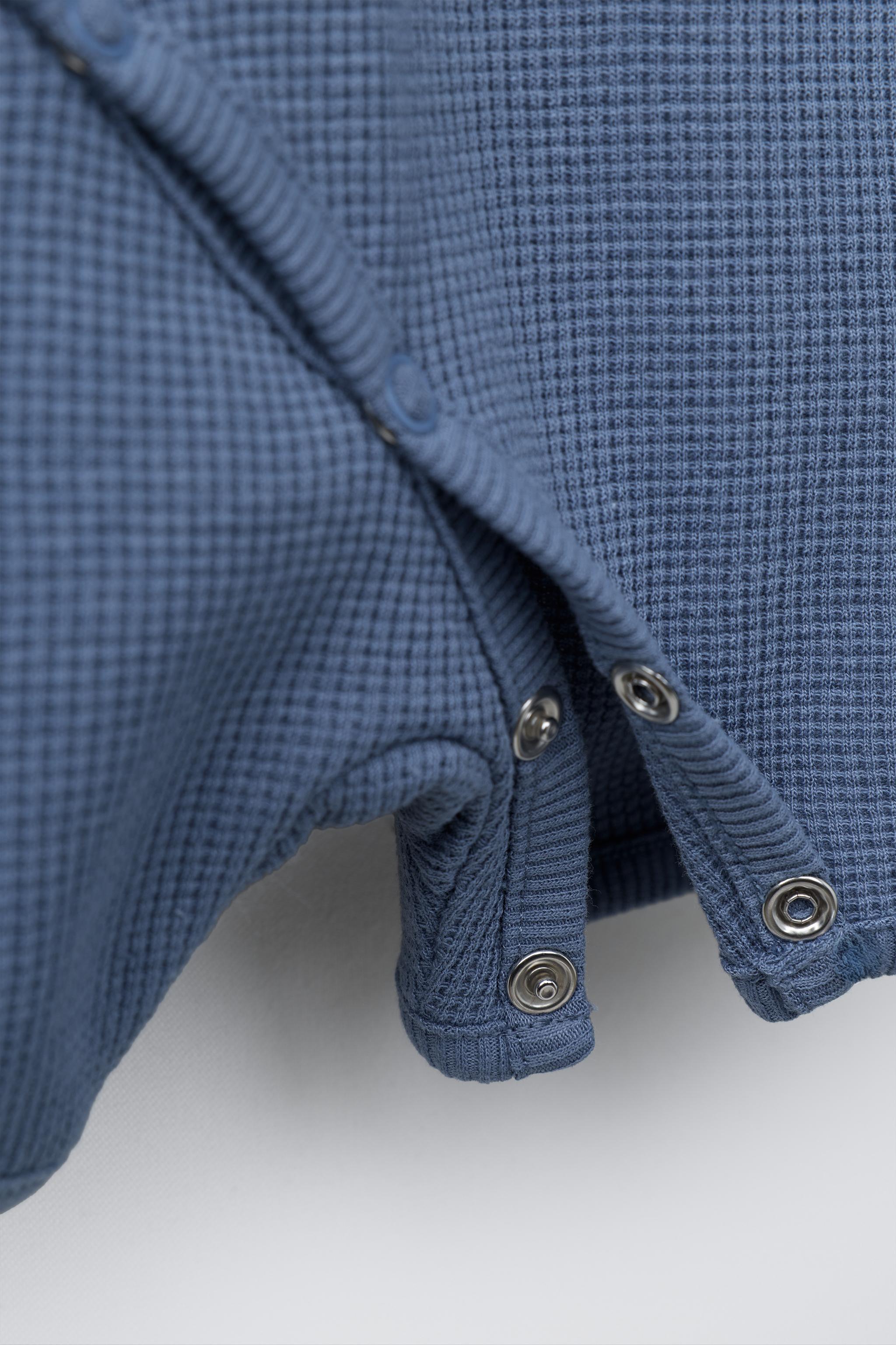 SHORT WAFFLE-KNIT SLEEPSUIT