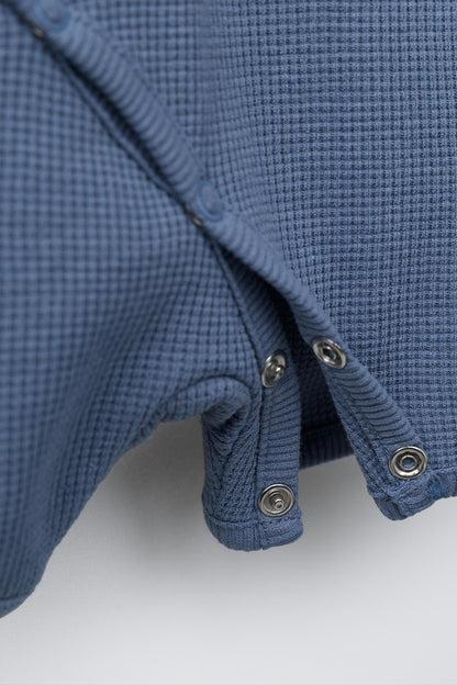 SHORT WAFFLE-KNIT SLEEPSUIT