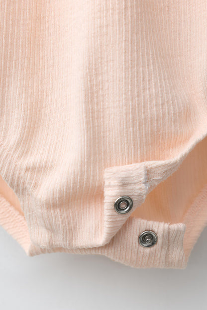 EMBROIDERED SUN RUFFLE BODYSUIT