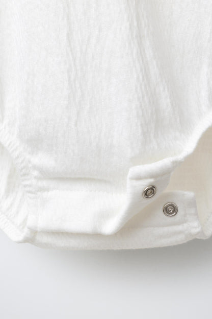 BODYSUIT WITH PETER PAN COLLAR AND SWISS EMBROIDERY