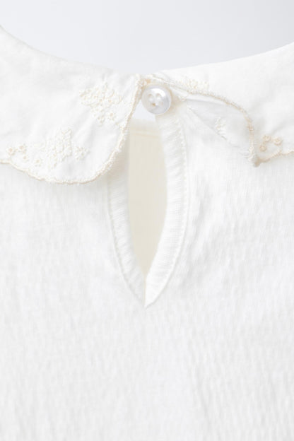 BODYSUIT WITH PETER PAN COLLAR AND SWISS EMBROIDERY