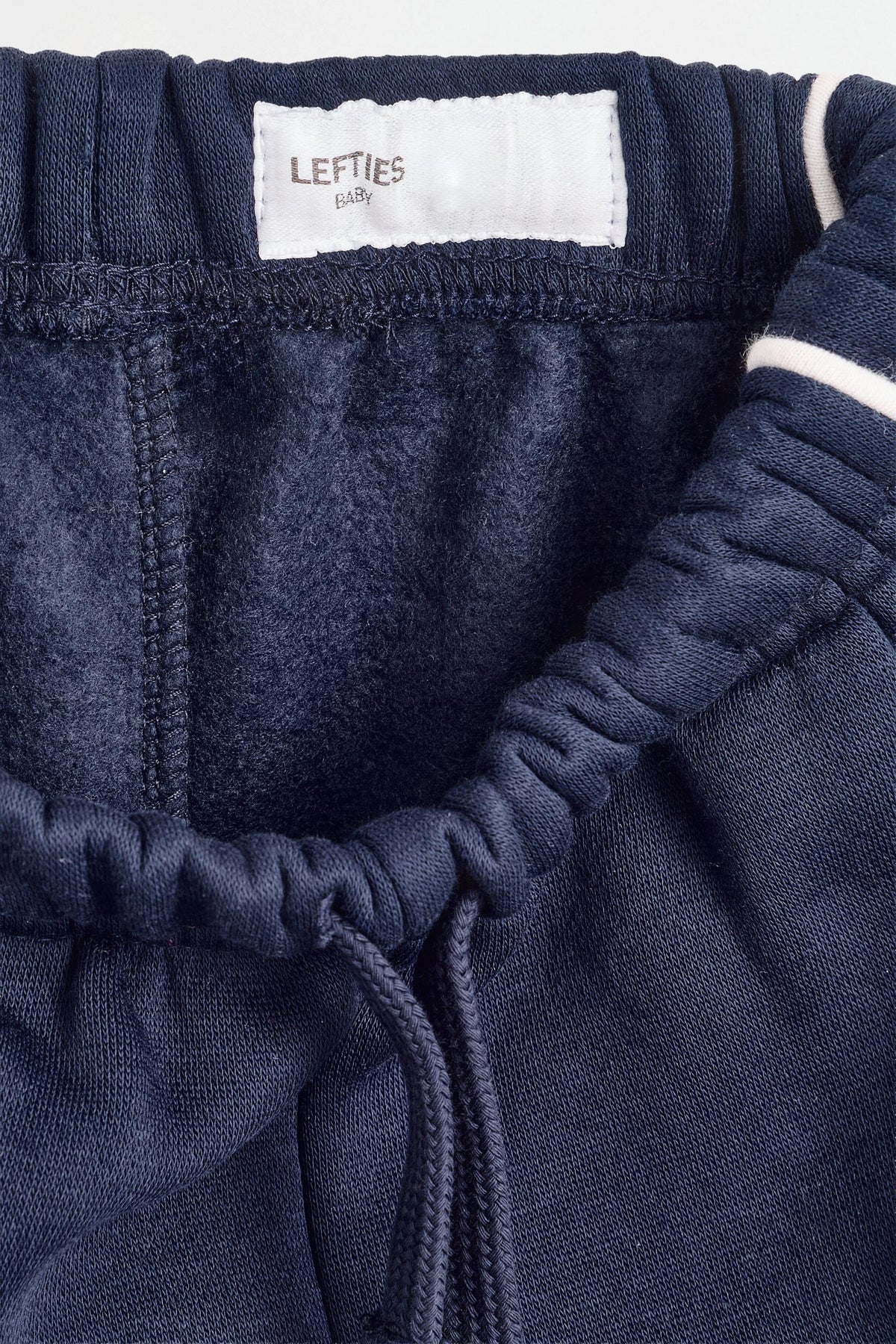 Plush trousers with piping
