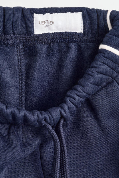 Plush trousers with piping