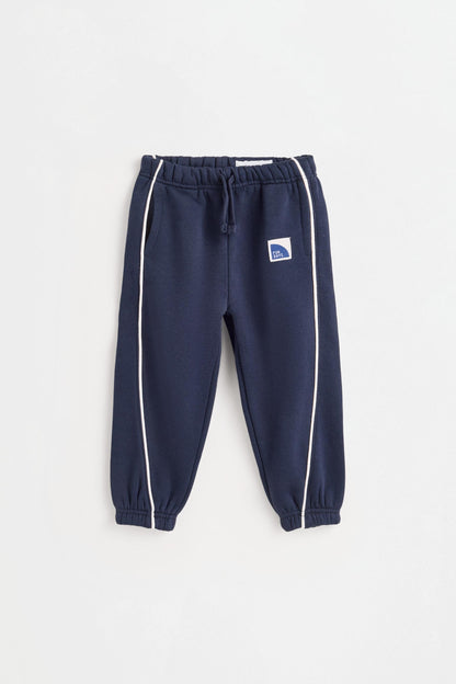 Plush trousers with piping