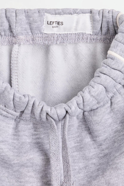 Plush trousers with piping