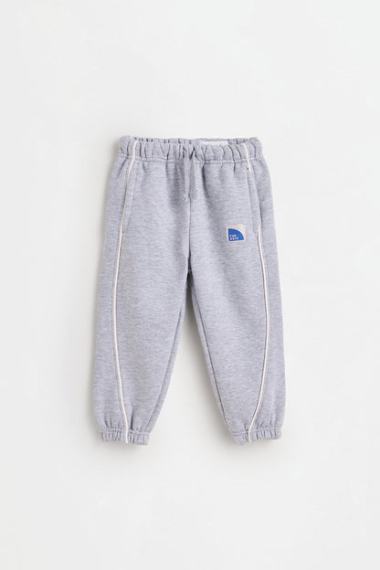Plush trousers with piping
