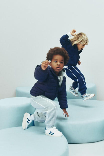 Plush trousers with piping