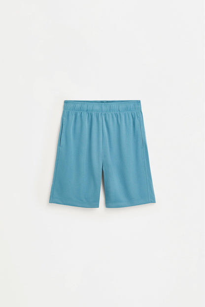 Sleeveless sports co-ord with Bermuda shorts