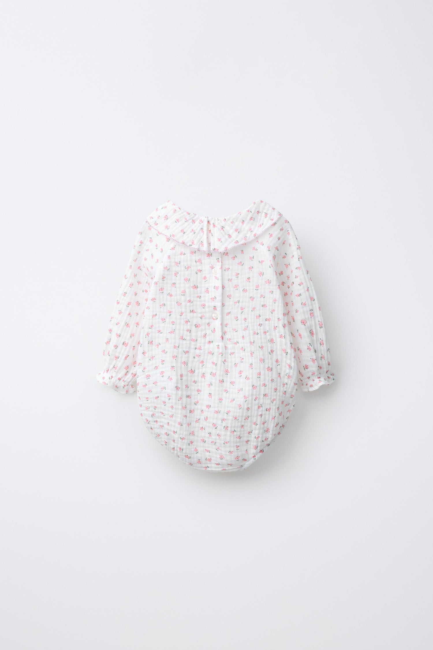 TEXTURED FLORAL BODYSUIT