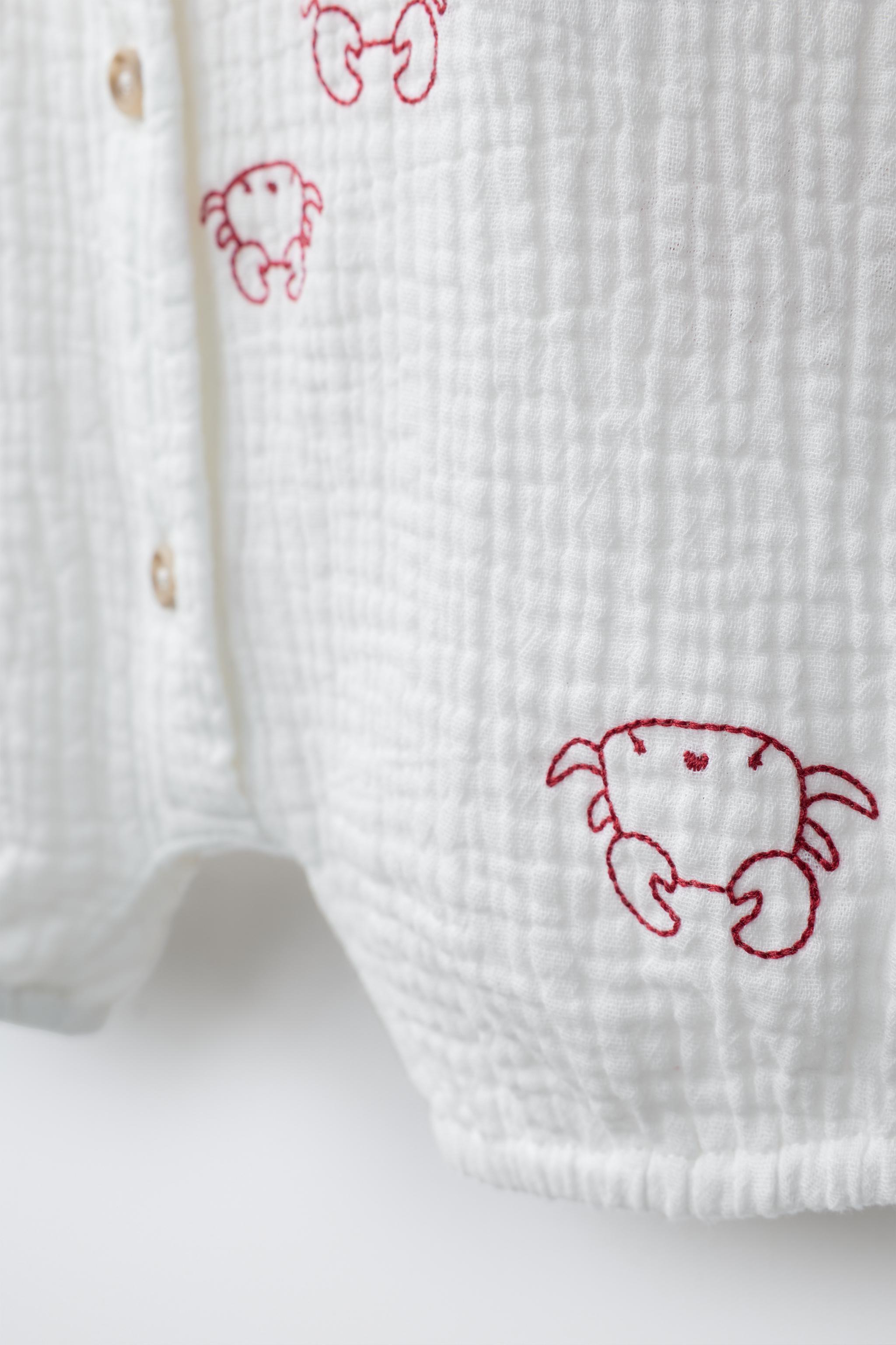 EMBROIDERED CRAB TEXTURED ROMPER