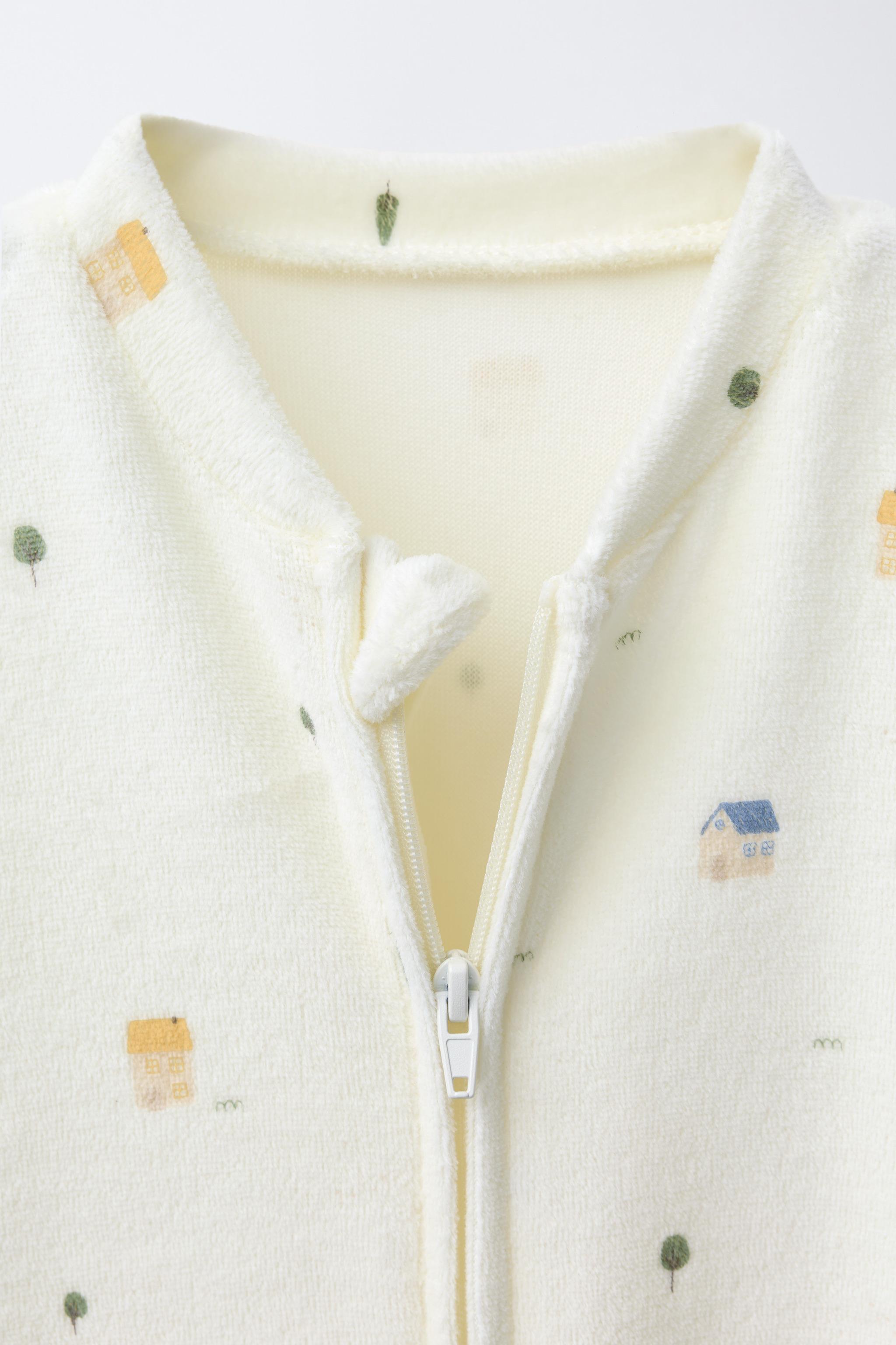 VELOUR HOUSES PRINT SLEEPSUIT