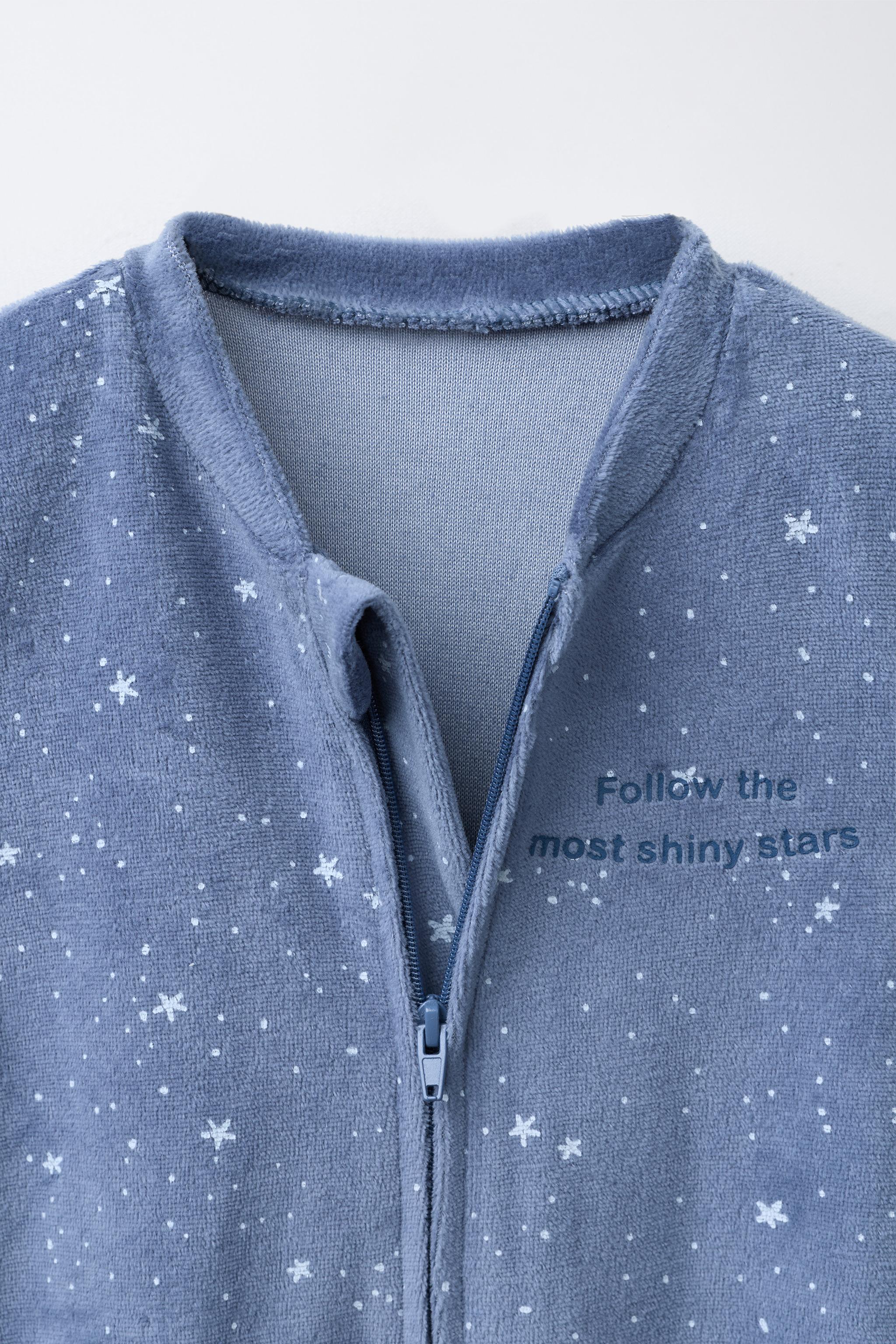 VELOUR STAR PRINT SLEEPSUIT