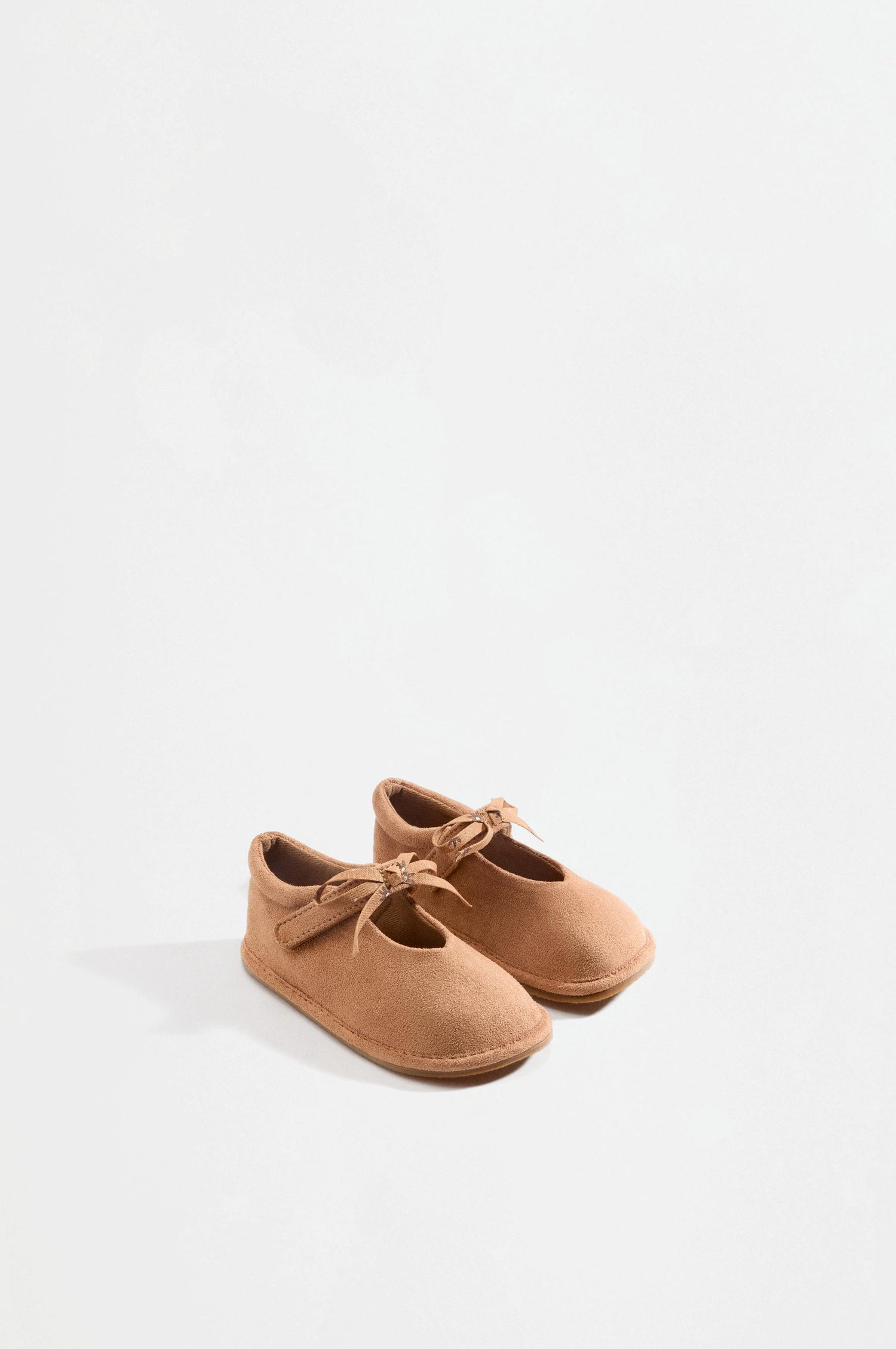Barefoot bow ballet flats