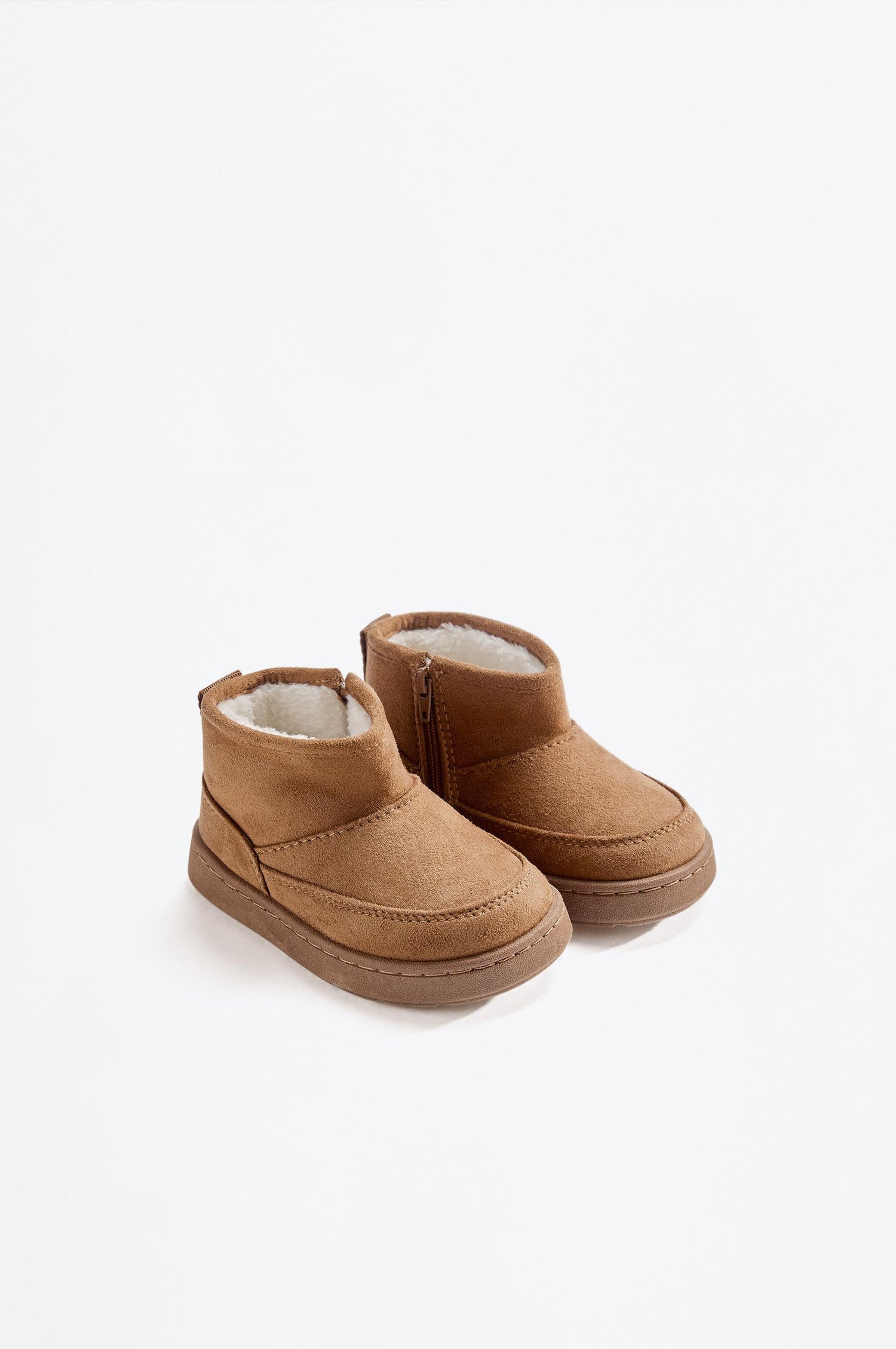 Lined faux fur boot