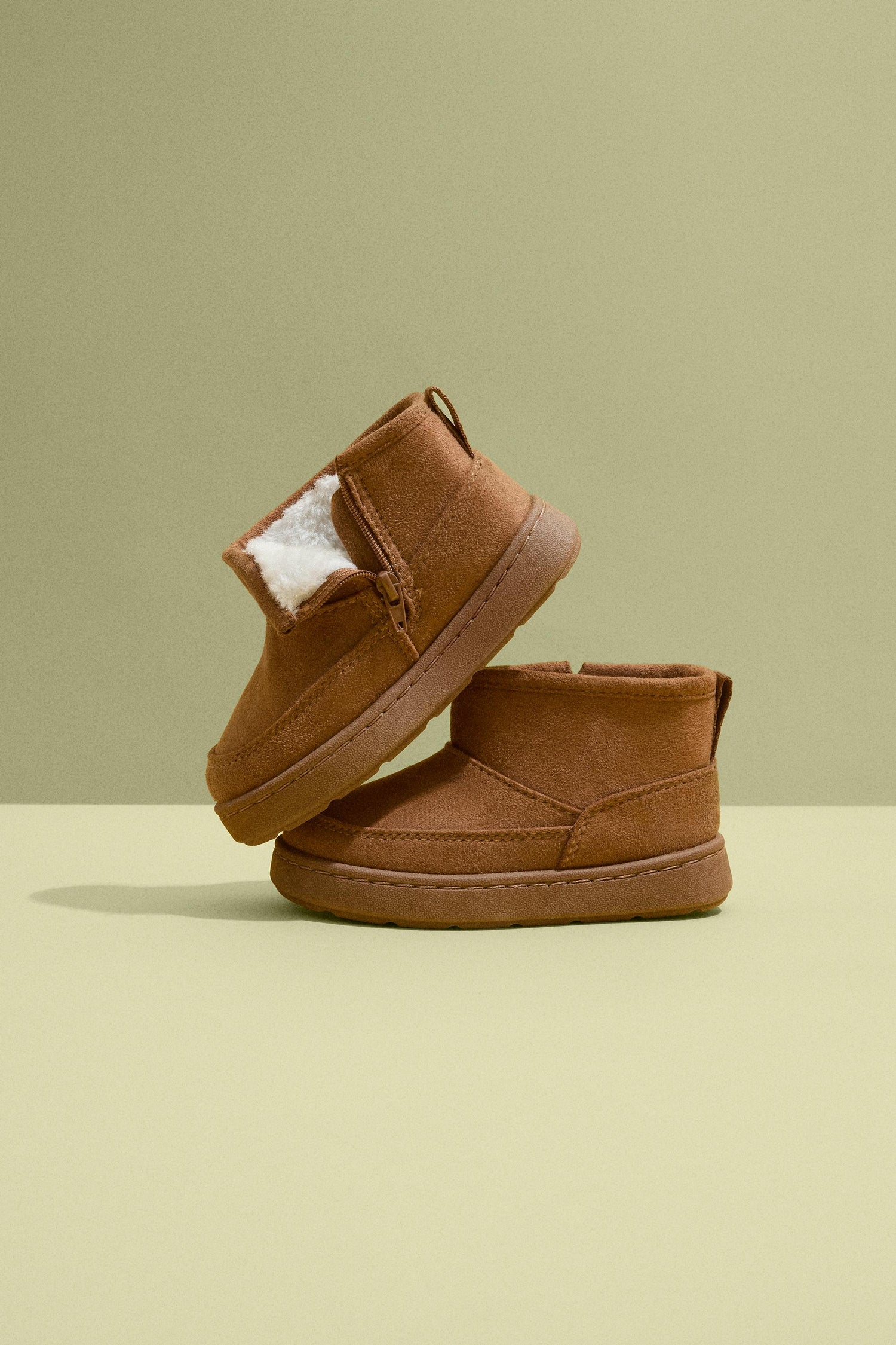 Lined faux fur boot