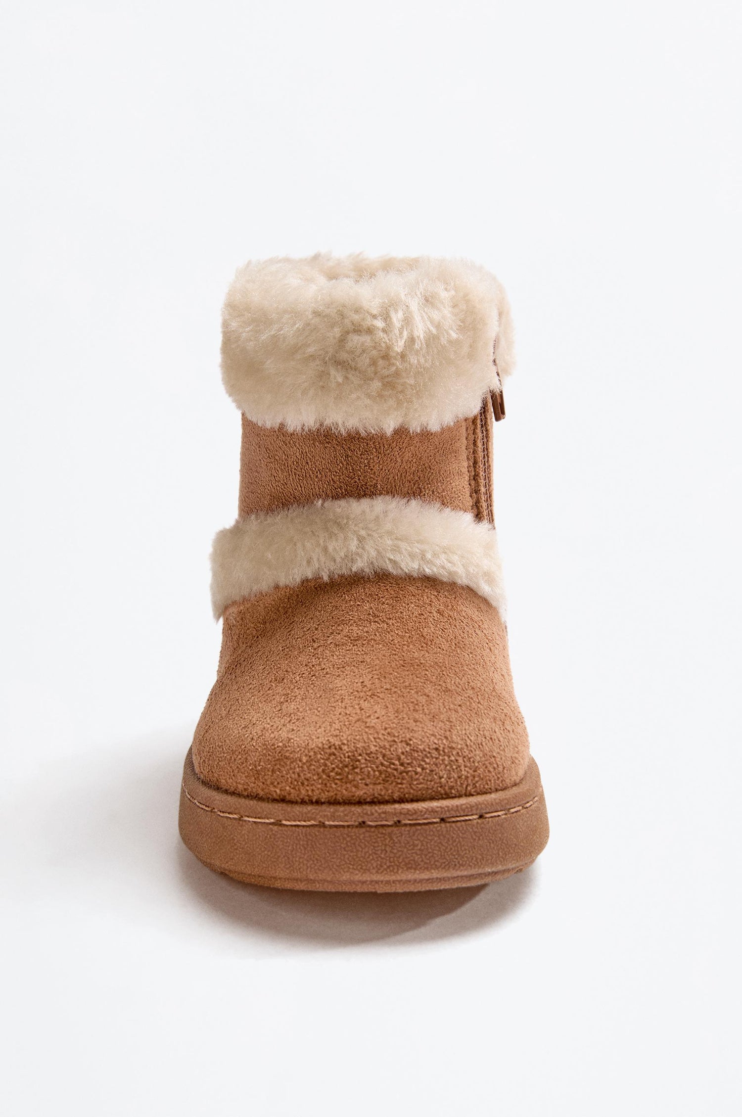 Knee-high fur boots