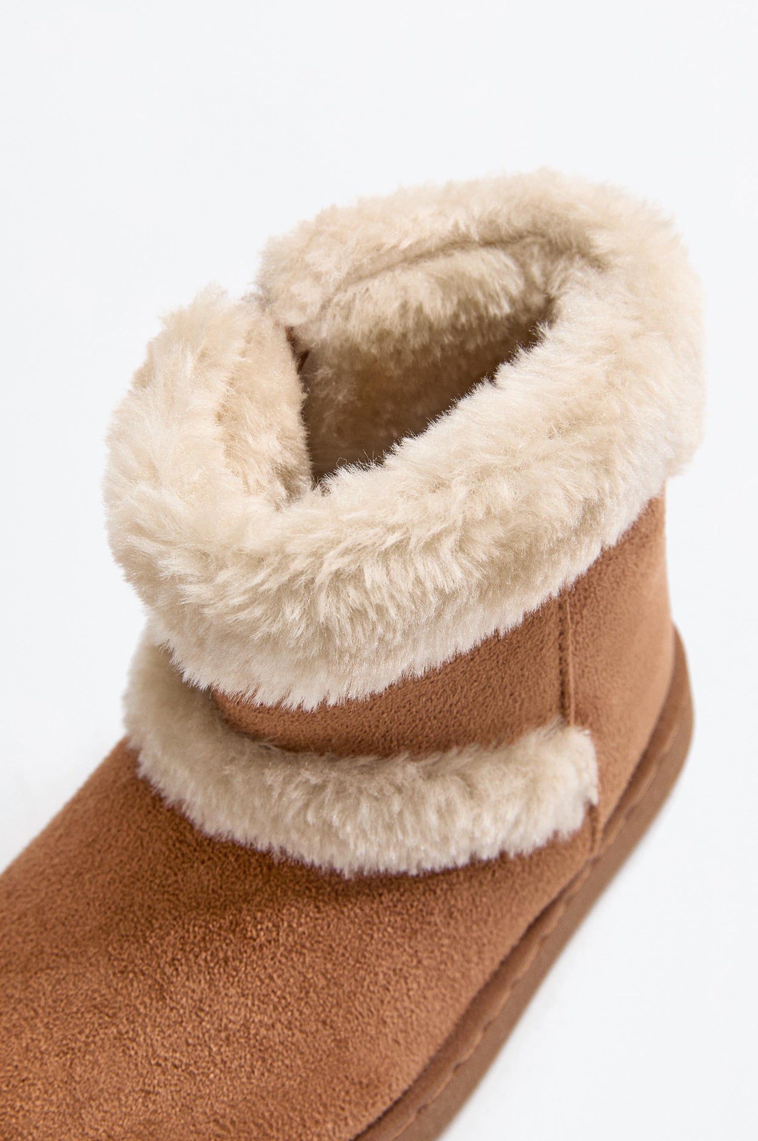 Knee-high fur boots