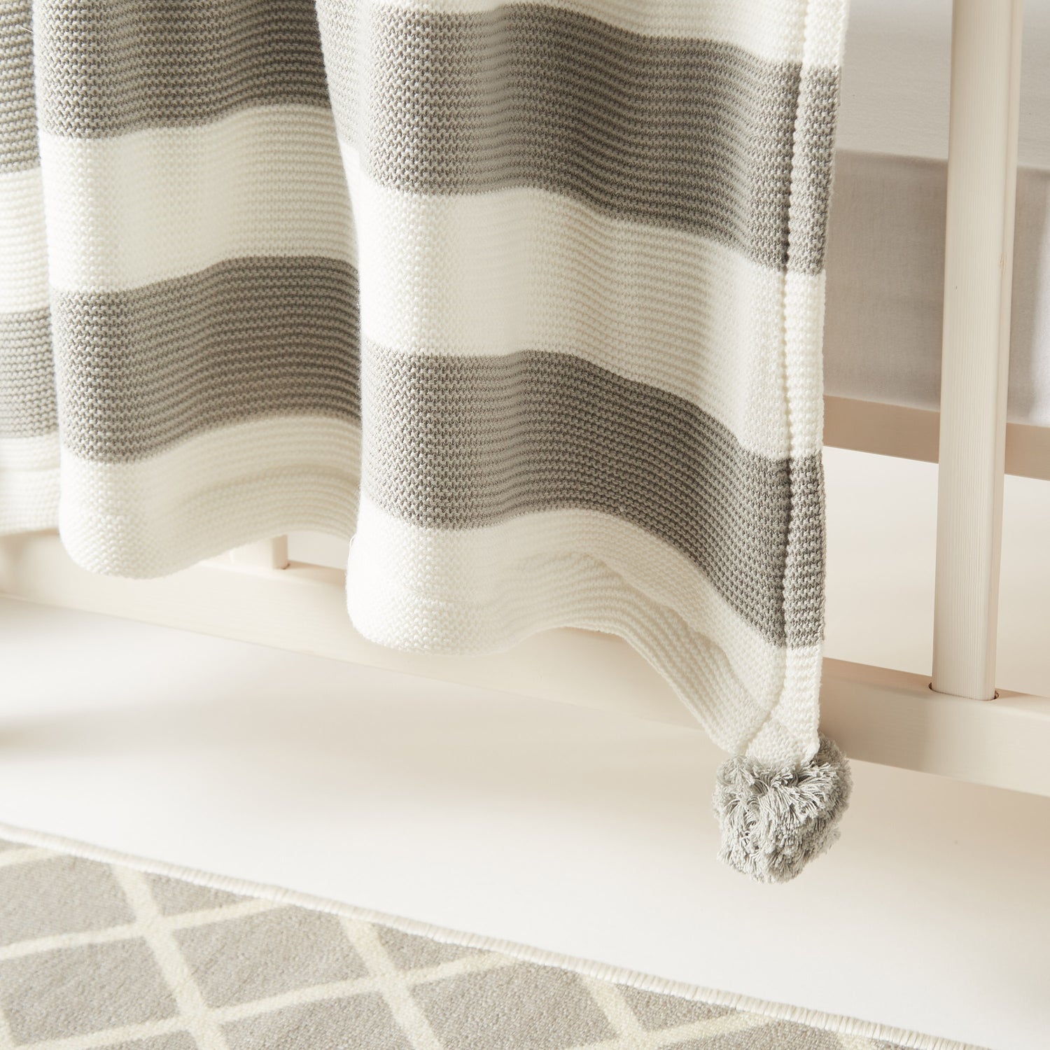 Juniors Striped Knitted Raschel Blanket with Pom Pom Detail - 100x80 cms