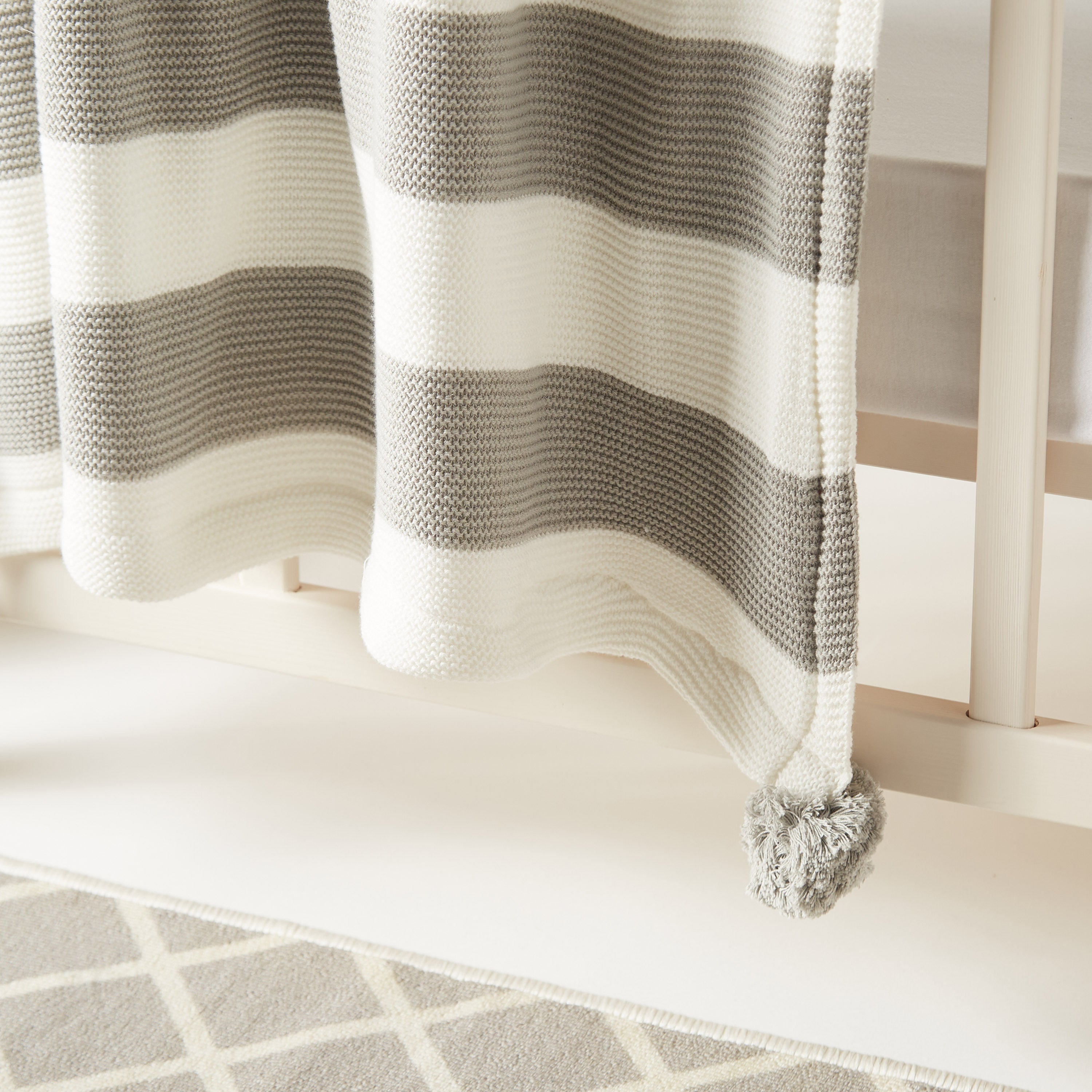 Juniors Striped Knitted Raschel Blanket with Pom Pom Detail - 100x80 cms