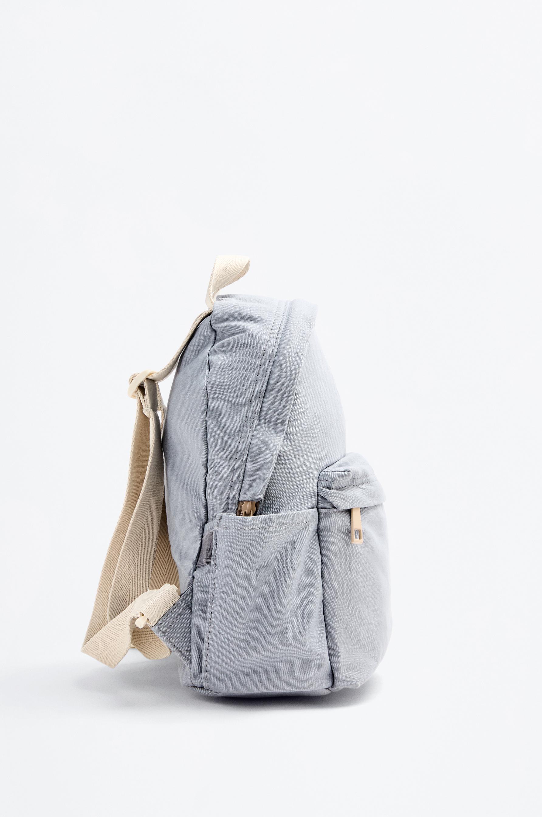 School backpack with bear detail
