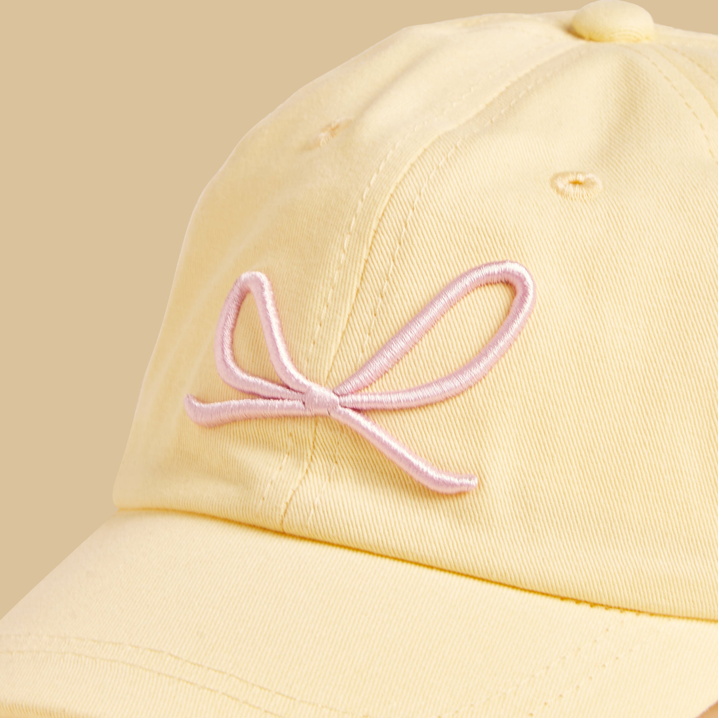 Bow Embellished Cap with Hook and Loop Closure