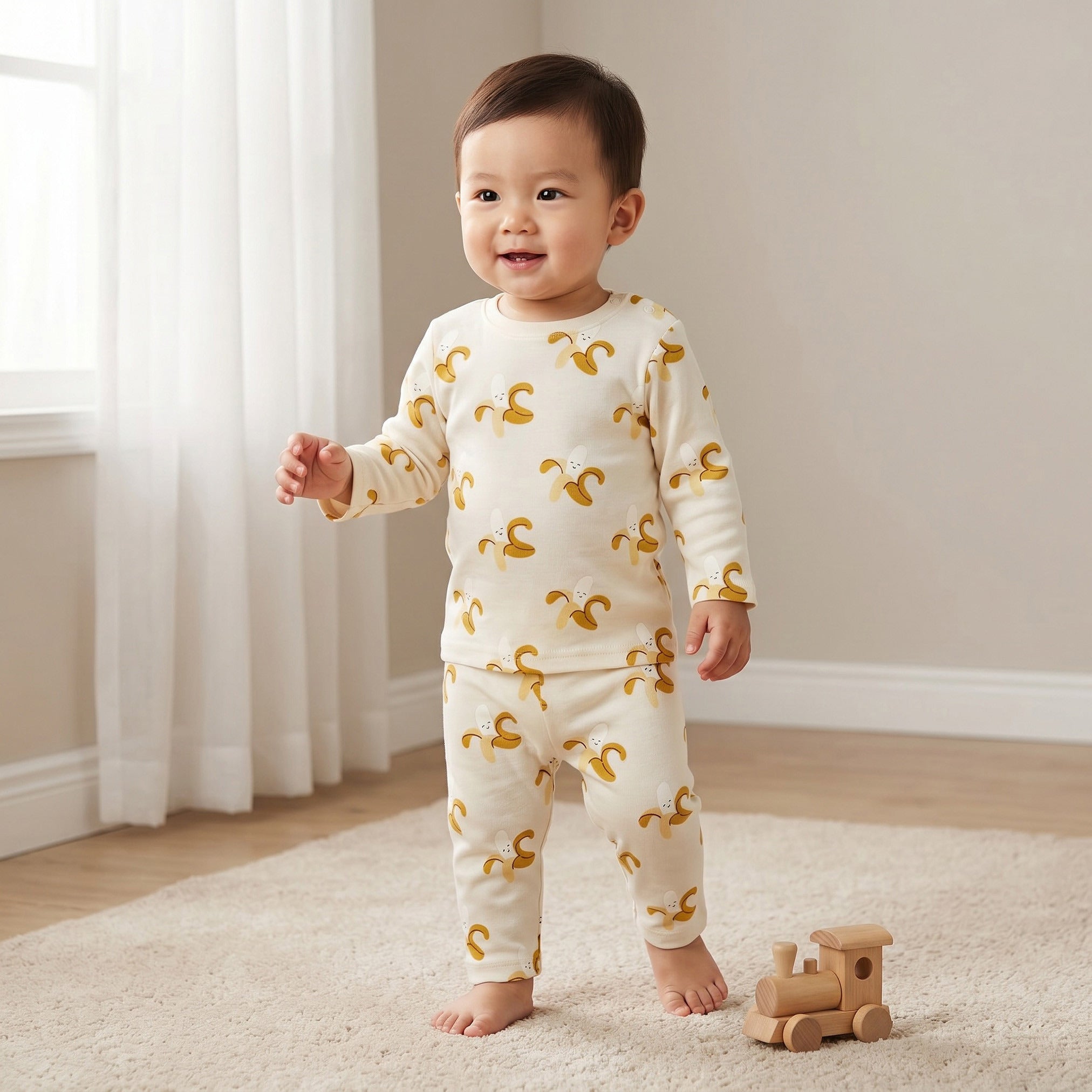 Juniors Cotton Round Neck Long Sleeves Pyjama Set with Banana Print - Cream / 12-18 mths