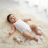 Juniors Solid Sleeveless Bodysuit with Button Closure - White / 12-18 mths