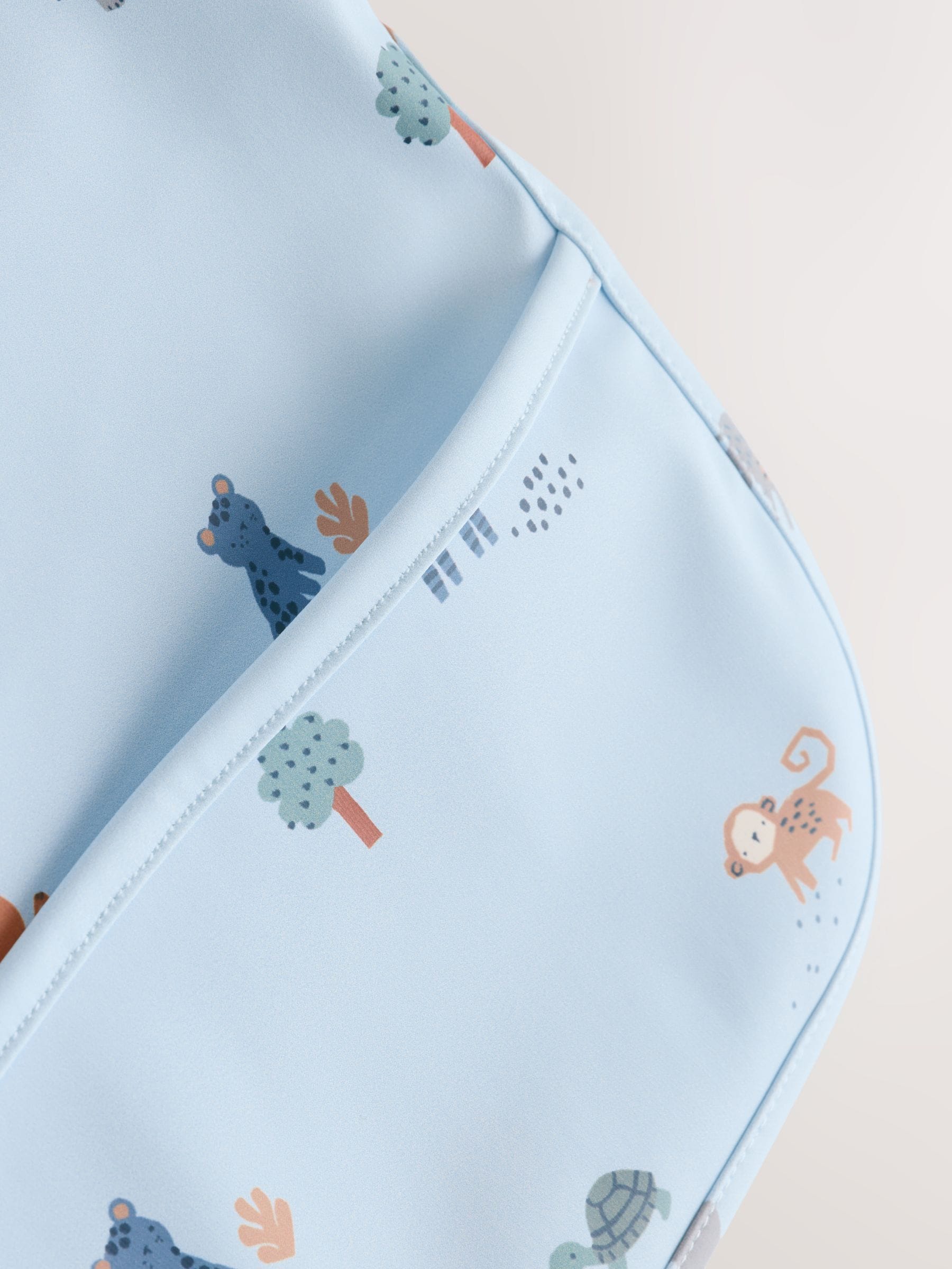 Blue Dino Jungle Weaning And Feeding Sleeved Bib - Size 6-12 Months (68-80cm)