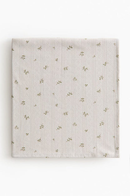 Pointelle-knit baby blanket
