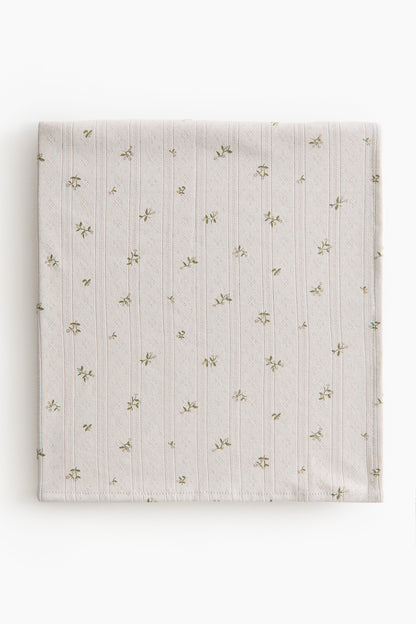 Pointelle-knit baby blanket