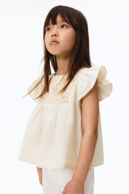 Appliquéd cotton blouse