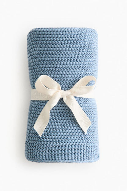 Moss-stitched cotton blanket