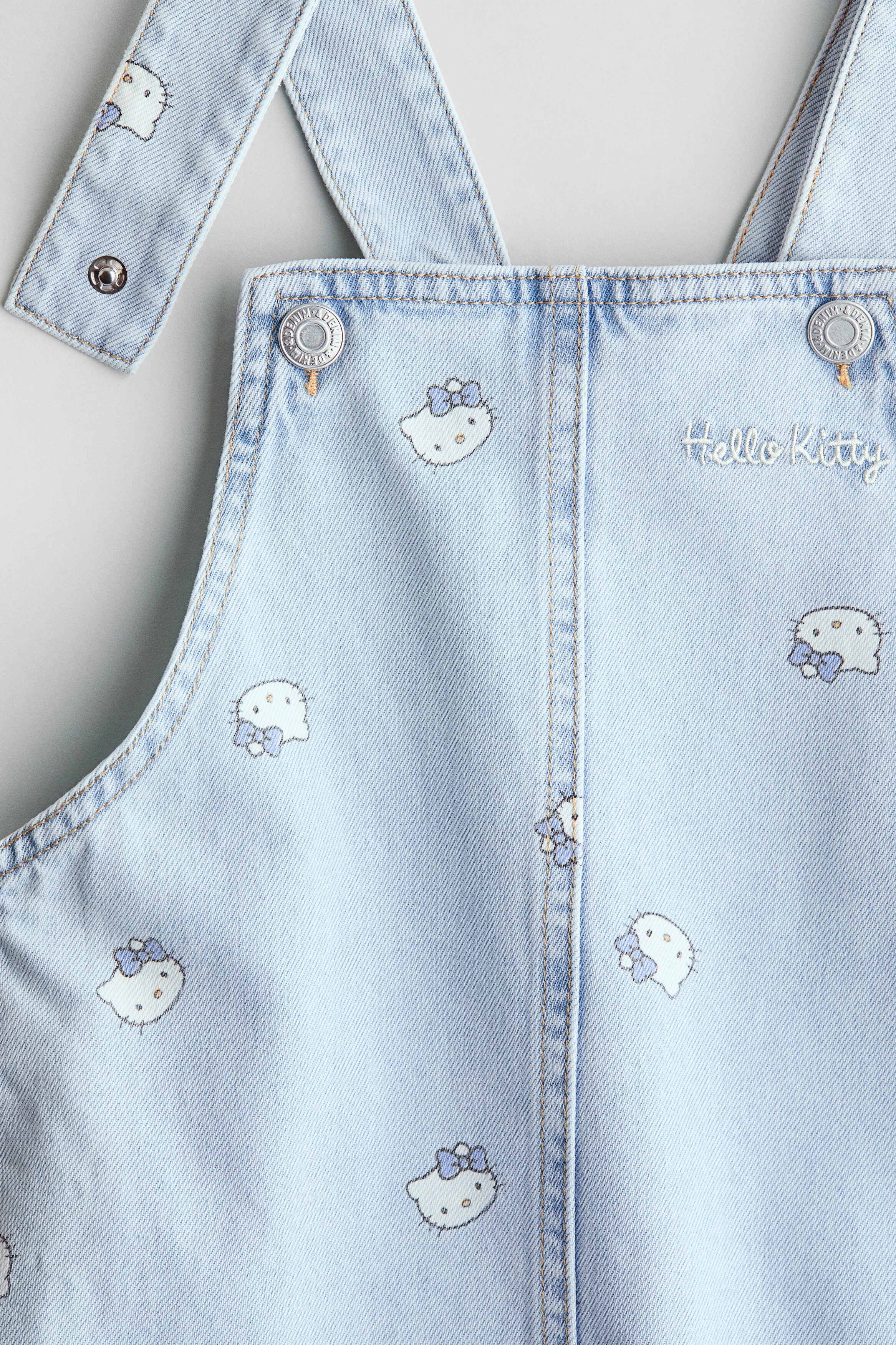 Printed dungaree dress