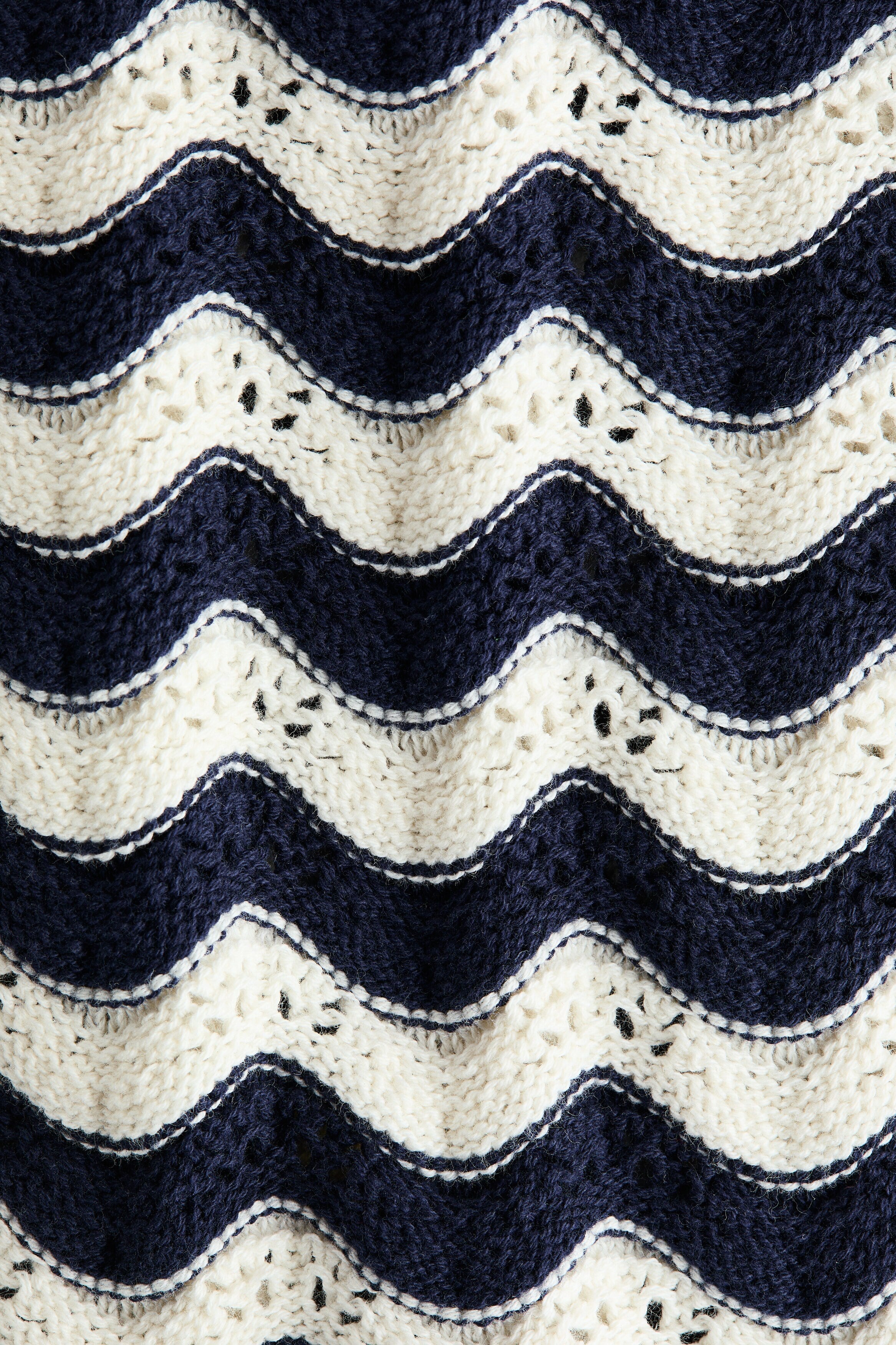 Appliquéd hole-knit dress