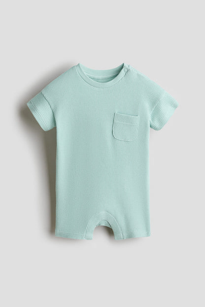 Waffled cotton romper suit - 9-12M