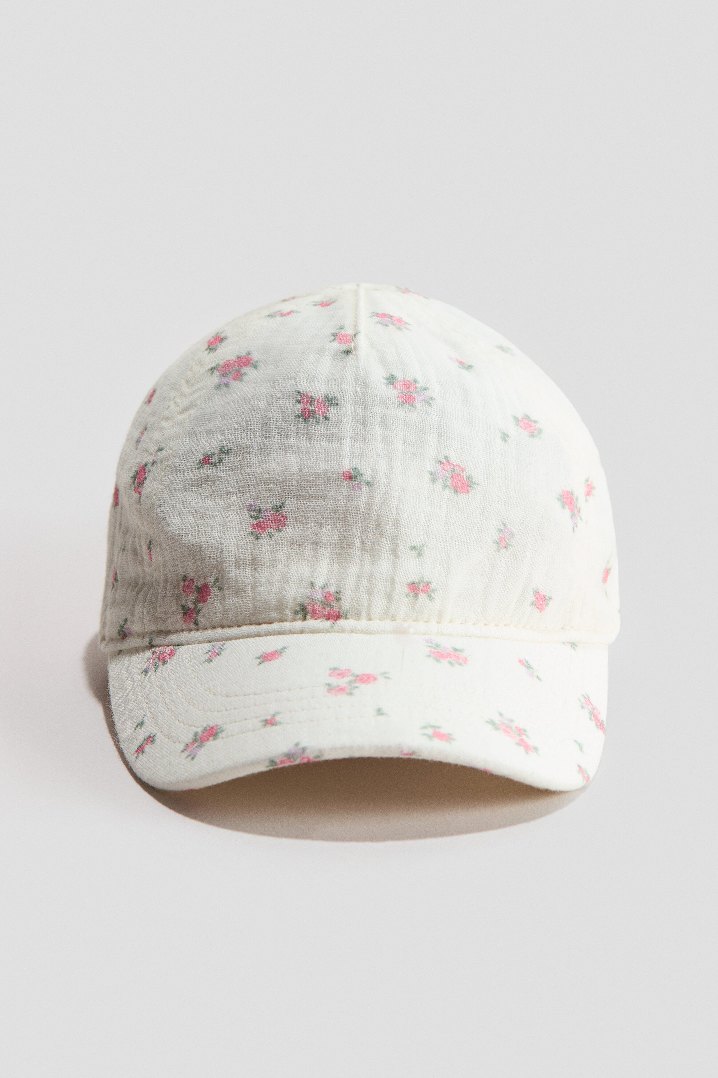 Bow-detail muslin cap