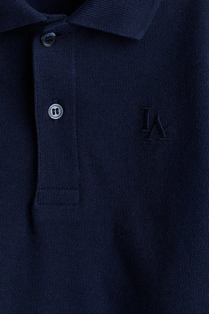 Embroidered-motif piqué polo shirt