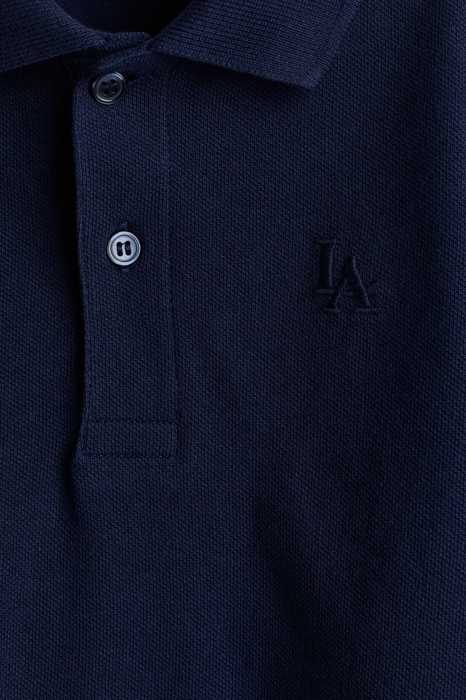 Embroidered-motif piqué polo shirt