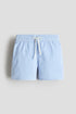 Patterned swim shorts
