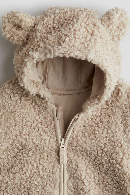 Hooded fluffy pramsuit