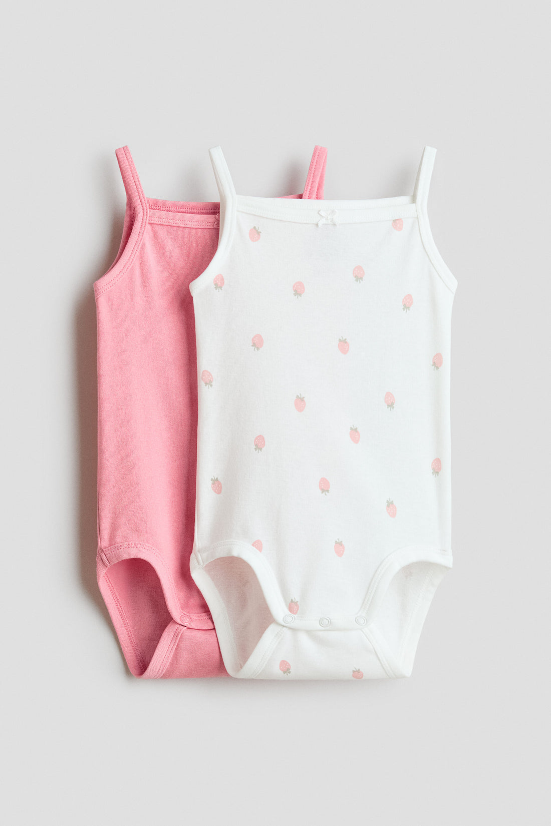 2-pack sleeveless cotton bodysuits - 18M