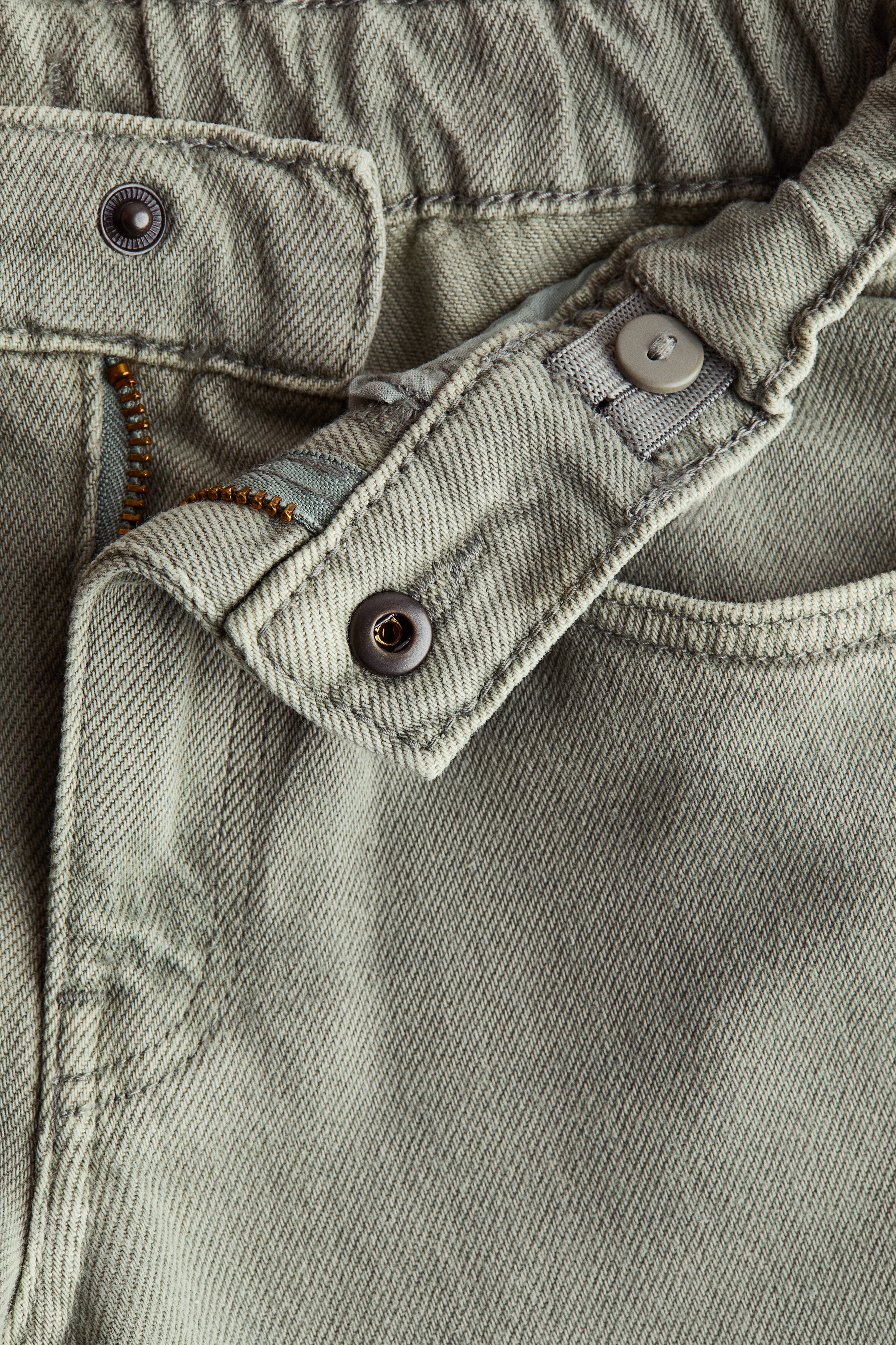 Tapered cotton-blend jeans